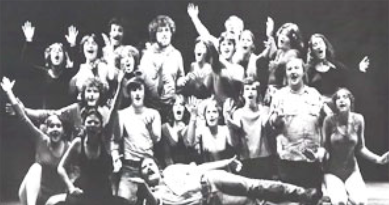 black and white pic of students on stage in play