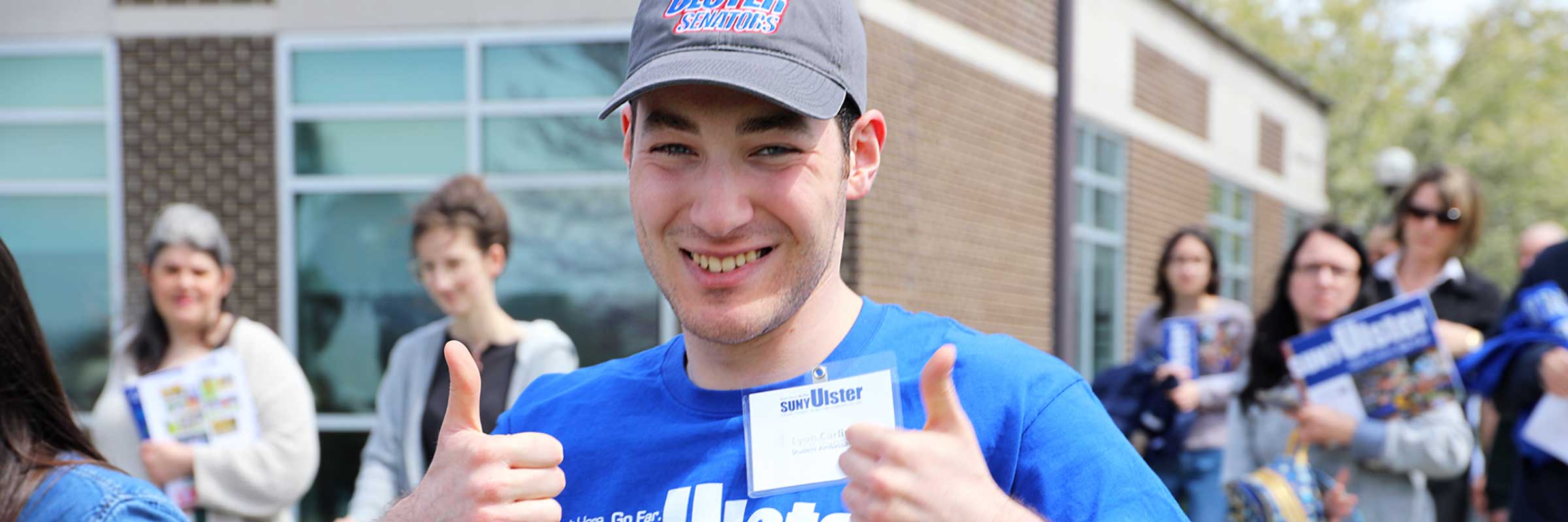 student giving thumbs up at SUNY Ulster event